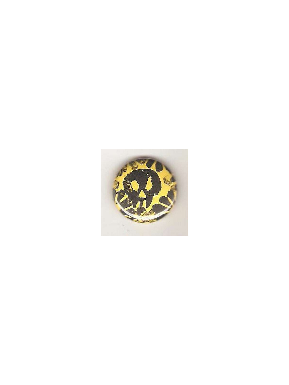 Badge jaune linogravure petit crâne et fleurs