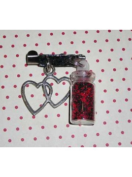 Broche fiole rouge et noire avec cœur