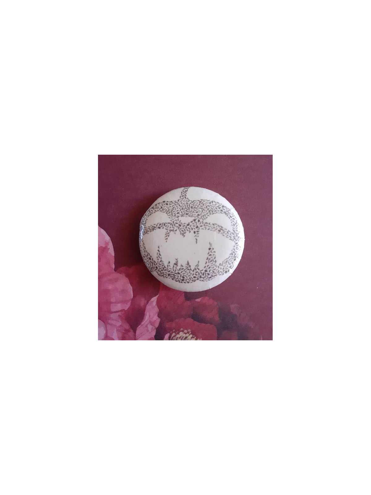 Badge citrouille en chauve-souris