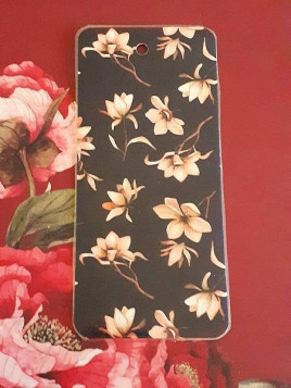 Marque-page plastifié noir et fleurs beiges en stock à la librairie ciel rouge à dijon