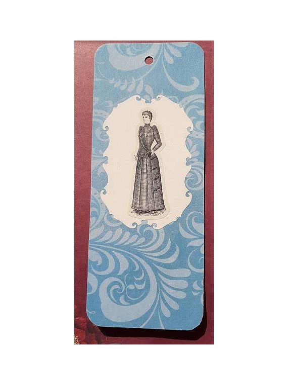 Grand marque-page femme sur fond bleu arabesques