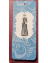 Grand marque-page femme sur fond bleu arabesques