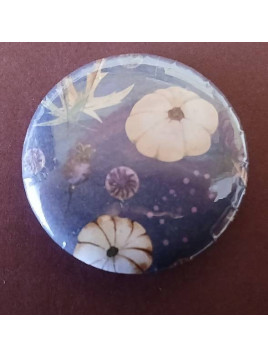 Badge Citrouille sur fond bleu