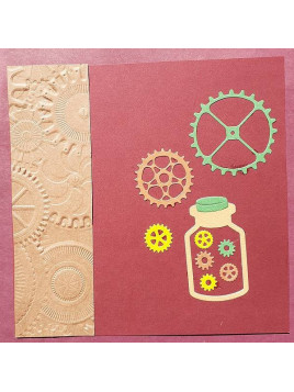 La carte faite main steampunk avec embossing rouages est disponible à Ciel rouge