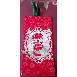 Le marque-page artisanal Halloween découpe créature Frankenstein sur fond rouge est disponible à Ciel rouge Dijon