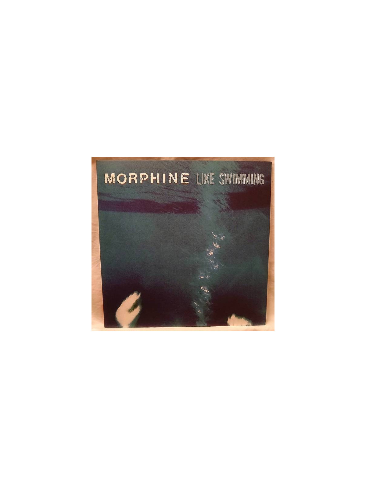 Le disque de Morphine : Like swimming est disponible en vinyle coloré d’occasion à Ciel rouge, disquaire à Dijon