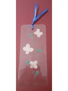 Le marque-page transparent avec fleurs séchées est disponible à Ciel rouge Dijon