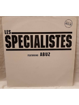 Le disque de Les spécialistes : Qui est disponible en vinyle à Ciel rouge, disquaire à Dijon