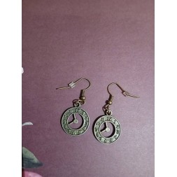 La paire de boucle d'oreille Horloges est disponible à Ciel rouge Dijon