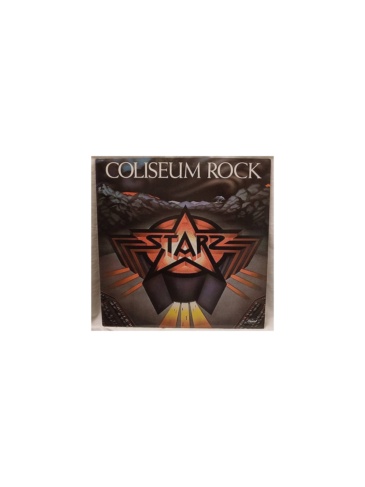 Le disque de Starz : Coliseum rock est disponible en vinyle à Ciel rouge, disquaire indépendant en Bourgogne
